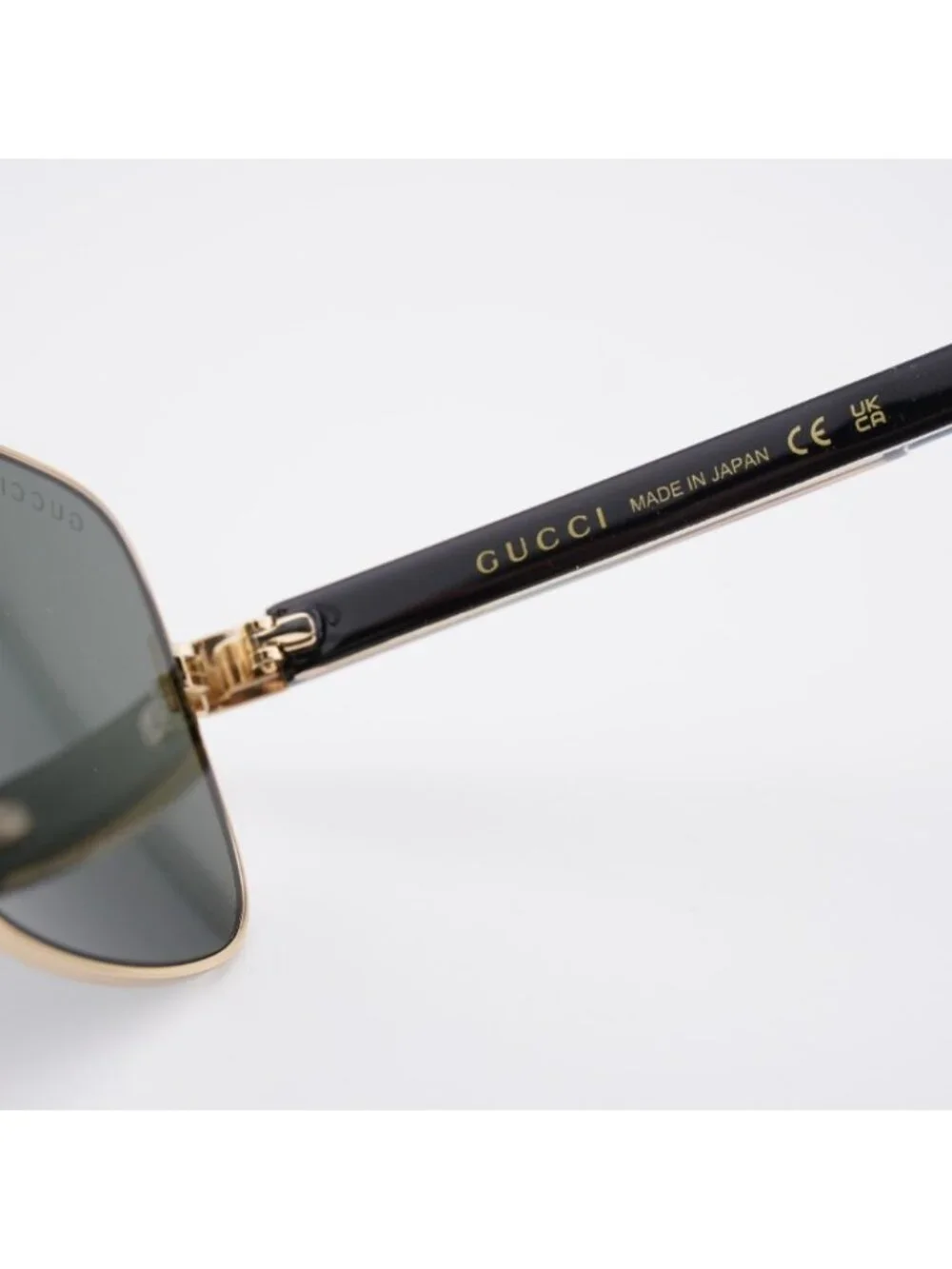 Gucci GG0529S 001 Sunglasses Gold with Black Square Frame, Grey Lenses
